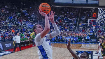 Mar 23, 2024; Pittsburgh, PA, USA; Creighton Bluejays center Ryan Kalkbrenner (11) shoots a layup against Oregon in the second round of the NCAA Tournament. 