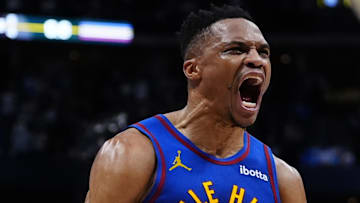 Apr 19, 2025; Denver, Colorado, USA; Denver Nuggets guard Russell Westbrook (4) reacts to his defensive turnover in overtime against the LA Clippers at Ball Arena. Mandatory Credit: Ron Chenoy-Imagn Images
