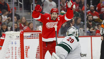 Feb 22, 2025; Detroit, Michigan, USA; Detroit Red Wings center Dylan Larkin (71) reacts to a goal scored in the second period at Little Caesars Arena. Mandatory Credit: Brian Bradshaw Sevald-Imagn Images