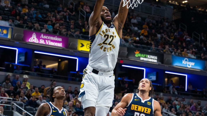 Nov 9, 2022; Indianapolis, Indiana, USA; Indiana Pacers forward Isaiah Jackson (22) shoots the ball while Denver Nuggets forward Aaron Gordon (50) defends in the second quarter at Gainbridge Fieldhouse. Mandatory Credit: Trevor Ruszkowski-USA TODAY Sports