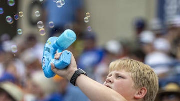 May 23, 2024; Hoover, AL, USA; A fan of the Tennessee Volunteers blows some bubbles during a game between the Volunteers and the Texas A&M Aggies during the SEC Baseball Tournament at Hoover Metropolitan Stadium. Mandatory Credit: Vasha Hunt-USA TODAY Sports