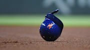 Aug 14, 2019; Cumberland, GA, USA; New York Mets first baseman Pete Alonso (not shown) throws his helmet after getting out against the Atlanta Braves during the seventh inning at SunTrust Park. Mandatory Credit: Adam C. Hagy-Imagn Images