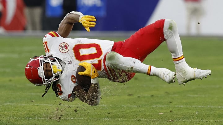 Jan 28, 2024; Baltimore, Maryland, USA; Kansas City Chiefs running back Isiah Pacheco (10) tumbles after catching a pass against the Baltimore Ravens during the first half in the AFC Championship football game at M&T Bank Stadium. Mandatory Credit: Geoff Burke-USA TODAY Sports