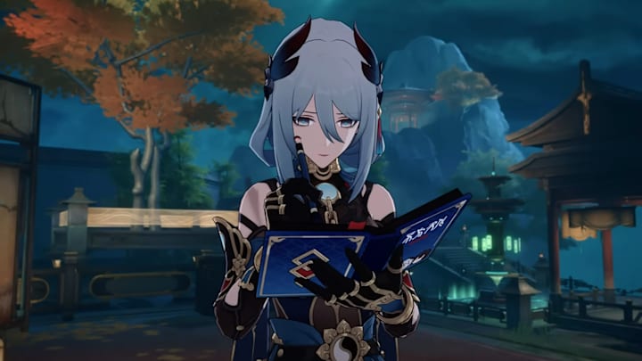 Honkai: Star Rail screenshot of Hanya writing something down in a ledger.