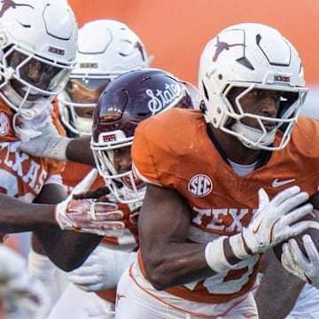 Texas Longhorns running back Quintrevion Wisner (26) advances the ball as the Texas Longhorns take on Mississippi State at Darrell K Royal-Texas Memorial Stadium in Austin Saturday, Sept. 28, 2024.