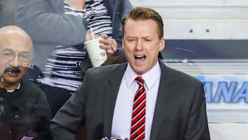 Mar 31, 2018; Calgary, Alberta, CAN; Calgary Flames head coach Glen Gulutzan on his bench against the Edmonton Oilers during the third period at Scotiabank Saddledome. Calgary Flames won 3-2. Mandatory Credit: Sergei Belski-Imagn Images