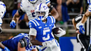 Oct 26, 2024; Durham, North Carolina, USA;Duke Blue Devils running back Peyton Jones (5) runs with the football during the second half of the game against Southern Methodist Mustangs at Wallace Wade Stadium. Mandatory Credit: Jaylynn Nash-Imagn Images
