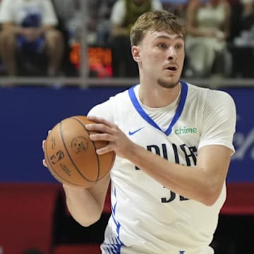 Jul 10, 2025; Las Vegas, NV, USA; Dallas Mavericks forward Cooper Flagg (32) looks to pass the ball against the Los Angeles Lakers in the first quarter of their game at Thomas & Mack Center. Mandatory Credit: Candice Ward-Imagn Images