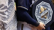 Ryan Braun is presented the National League MVP award (Kenesaw Mountain Landis Award )  by Brewers owner Mark Attanasio and his wife Debbie and former Brewer Robin Yount in ceremonies before the start of the Milwaukee Brewers-Colorado Rockies MLB baseball game at Miller Park, Sunday, April 22, 2012.