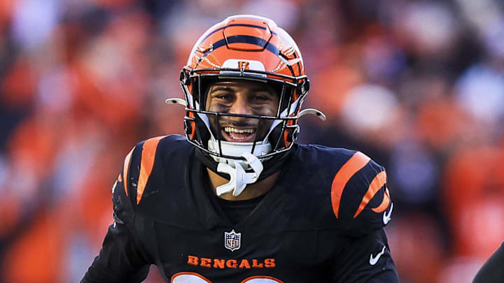 Dec 22, 2024; Cincinnati, Ohio, USA; Cincinnati Bengals safety Geno Stone (22) reacts after intercepting a pass against the Cleveland Browns in the second half at Paycor Stadium. Mandatory Credit: Katie Stratman-Imagn Images