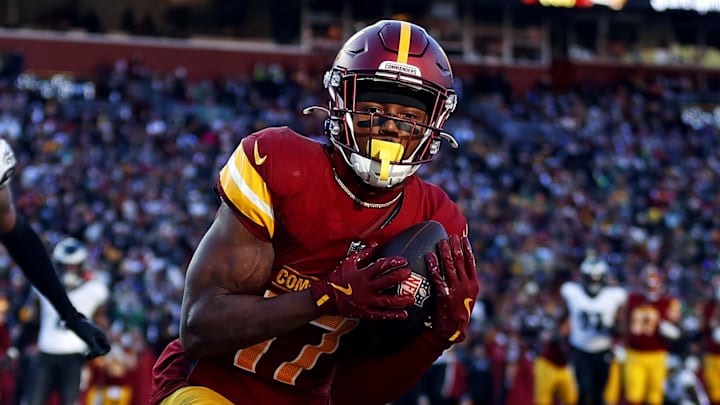 Washington Commanders wide receiver Terry McLaurin catches a touchdown pass.