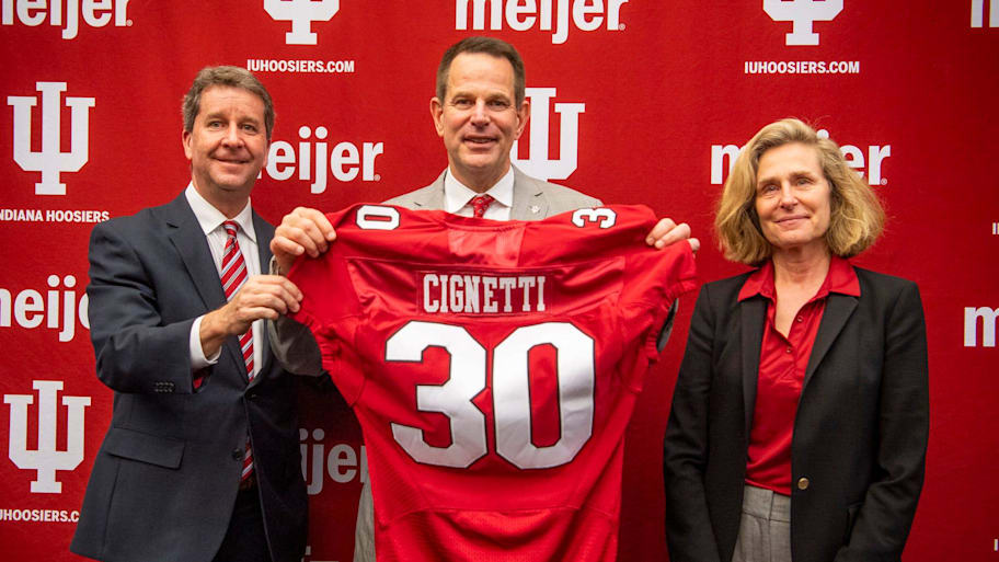 Indiana athletic director Scott Dolson, football coach Curt Cignetti and school president Pamela Whitten.