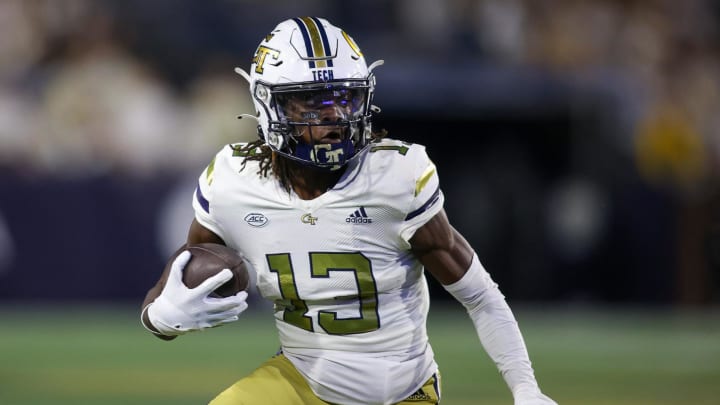 Nov 18, 2023; Atlanta, Georgia, USA; Georgia Tech Yellow Jackets wide receiver Eric Singleton Jr. (13) runs after a catch against the Syracuse Orange in the first half at Bobby Dodd Stadium at Hyundai Field. Mandatory Credit: Brett Davis-USA TODAY Sports