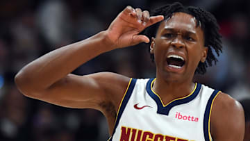 Oct 14, 2025; Denver, Colorado, USA; Denver Nuggets forward Peyton Watson (8) reacts after being fouled during the first half against the Chicago Bulls at Ball Arena. Mandatory Credit: Christopher Hanewinckel-Imagn Images