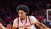 Dec 10, 2024; Piscataway, New Jersey, USA; Rutgers Scarlet Knights guard Dylan Harper (2) drives to the basket against Penn State Nittany Lions guard Freddie Dilione V (4) during the second half at Jersey Mike's Arena. Mandatory Credit: Vincent Carchietta-Imagn Images
