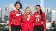 Nebraska volleyball coach Dani Busboom Kelly with players Rebekah Allick and Harper Murray at 2025 Big Ten Media Days in Chicago.