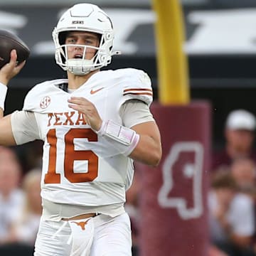 Oct 25, 2025; Starkville, Mississippi, USA; Texas Longhorns quarterback Arch Manning (16) passes the ball during the second quarter against the Mississippi State Bulldogs at Davis Wade Stadium at Scott Field. Mandatory Credit: Petre Thomas-Imagn Images