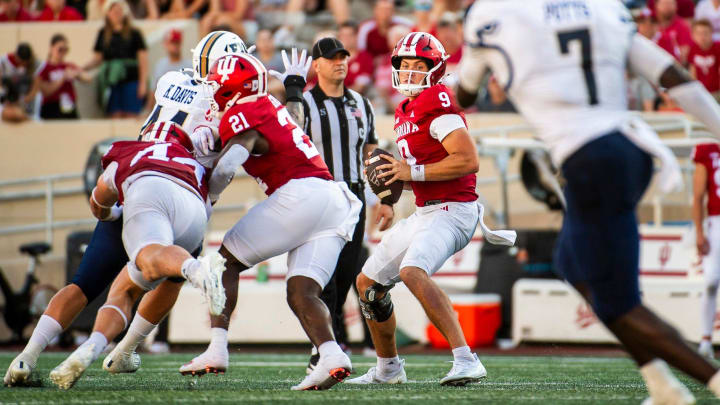 Indiana's Kurtis Rourke (9) looks downfield during the second half of the Indiana versus Florida International football game at Memorial Stadium on Saturday, Aug. 31, 2024.