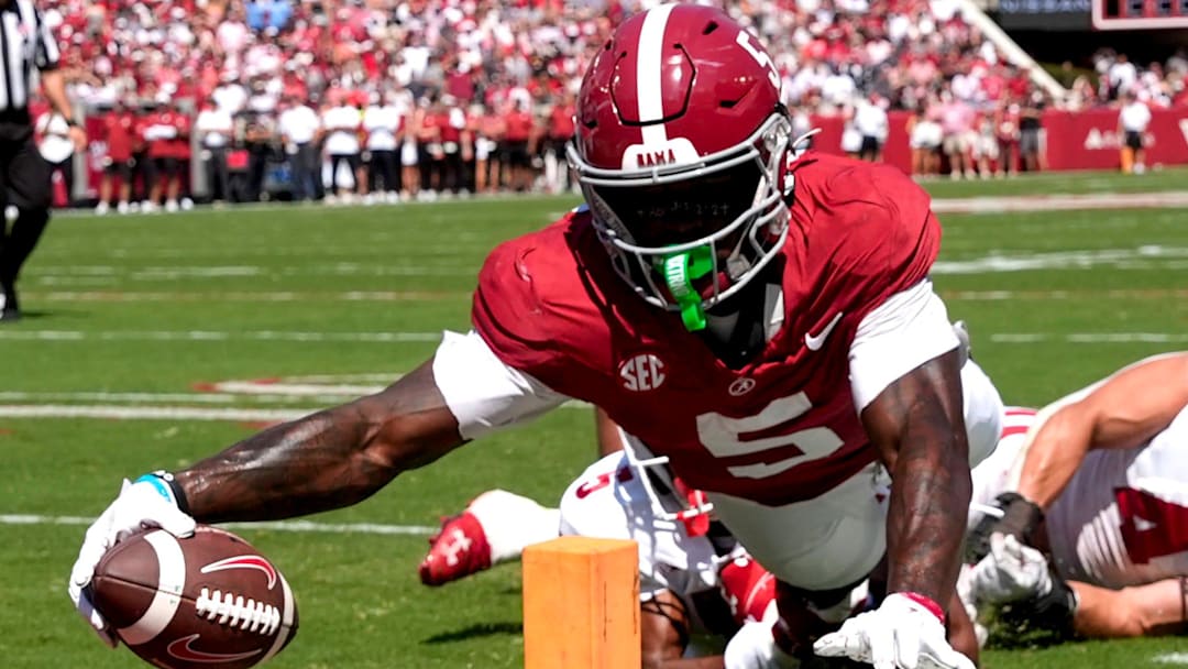 Alabama receiver Germie Bernard (5) dives for a score at the pylon against Wisconsin.