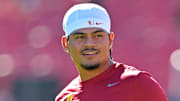 Oct 11, 2025; Los Angeles, California, USA;  USC Trojans quarterback Jayden Maiava (14) warms up prior to the game against the Michigan Wolverines at United Airlines Field at the Los Angeles Memorial Coliseum. Mandatory Credit: Jayne Kamin-Oncea-Imagn Images
