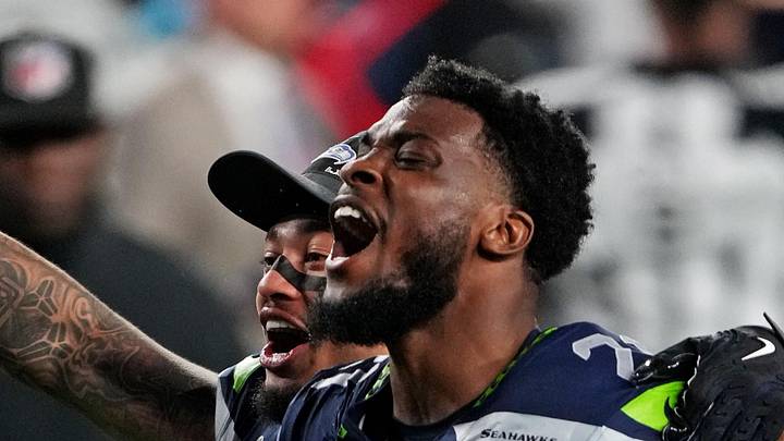 Seattle Seahawks cornerback Devon Witherspoon celebrates
