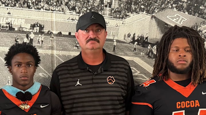 Cocoa High football, coached by Ryan Schneider (third from right), will go for a fourth consecutive state championships this fall. Cocoa, which has won seven titles overall, is one of the state's premier programs.