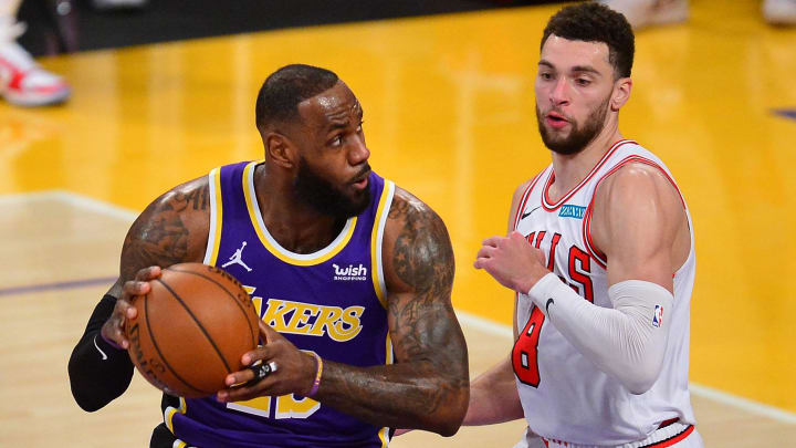 Jan 8, 2021; Los Angeles, California, USA; Los Angeles Lakers forward LeBron James (23) moves to the basket against Chicago Bulls guard Zach LaVine (8) during the first half at Staples Center. 