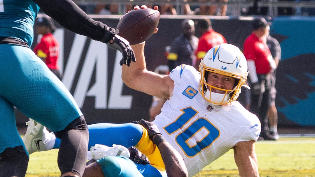 I need a hug and a Beer: Justin Herbert goes down hard in the first quarter in Jacksonville, a day when the Chargers couldn't do anything right.