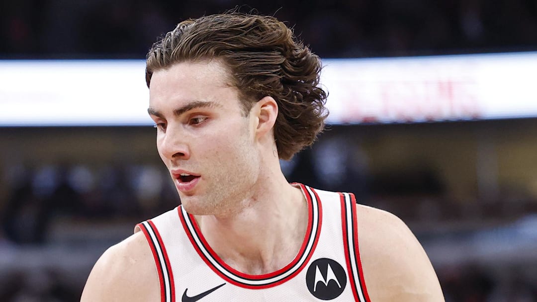 Mar 3, 2026; Chicago, Illinois, USA; Oklahoma City Thunder guard Luguentz Dort (5) defends against Chicago Bulls guard Josh Giddey (3) during the first half at United Center. Mandatory Credit: Kamil Krzaczynski-Imagn Images