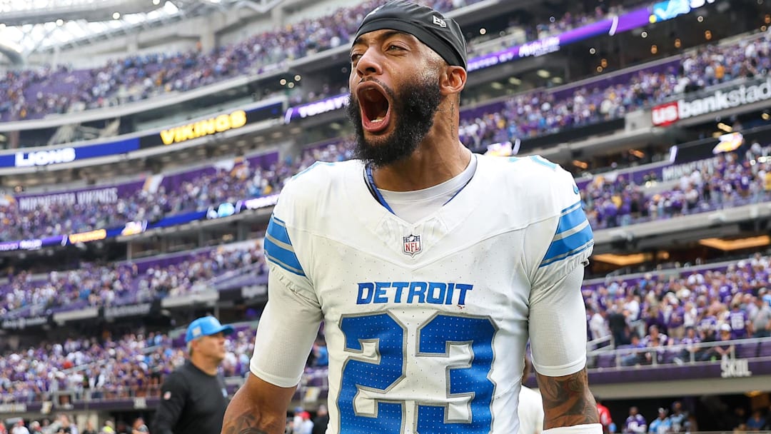 Former Detroit Lions cornerback Carlton Davis III (23) celebrates his team's win after the game against the Minnesota Vikings at U.S. Bank Stadium.