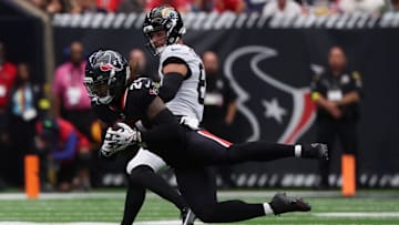 Houston Texans cornerback Derek Stingley Jr. extends for one of the most impressive one-handed interceptions you'll ever see against the Jacksonville Jaguars