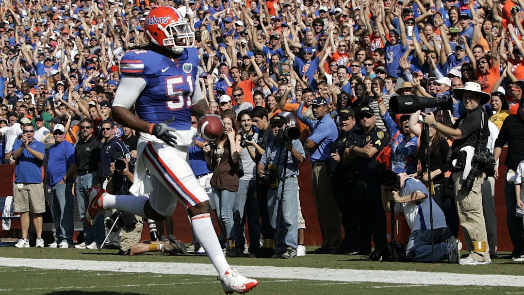 November 21, 2009; Gainesville, FL; Florida Gators linebacker Brandon Spikes (51) intercepts the ball and runs it back for a touchdown against FIU Golden Panthers at Ben Hill Griffin Stadium.
