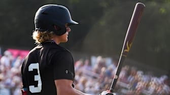 Falmouth's Maika Niu on deck during a Cape Cod Baseball League game against Cotuit at Lowell Park in Cotuit, MA on July 11, 2025.