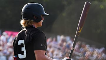 Falmouth's Maika Niu on deck during a Cape Cod Baseball League game against Cotuit at Lowell Park in Cotuit, MA on July 11, 2025.