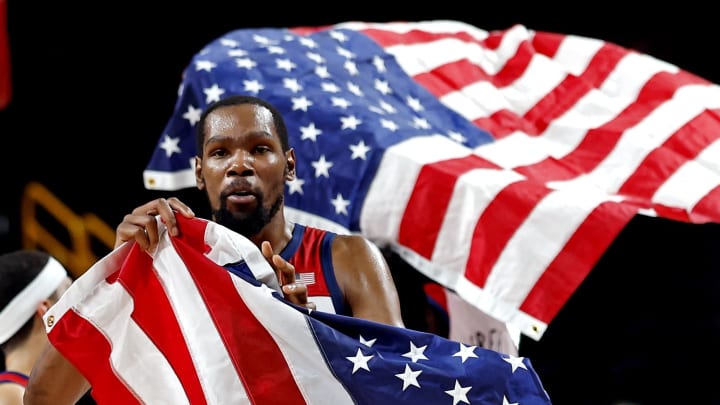 Aug 7, 2021; Saitama, Japan; United States forward Kevin Durant (7) celebrates winning the gold medal against France in the men's basketball gold medal game during the Tokyo 2020 Olympic Summer Games at Saitama Super Arena. Mandatory Credit: Geoff Burke-USA TODAY Sports