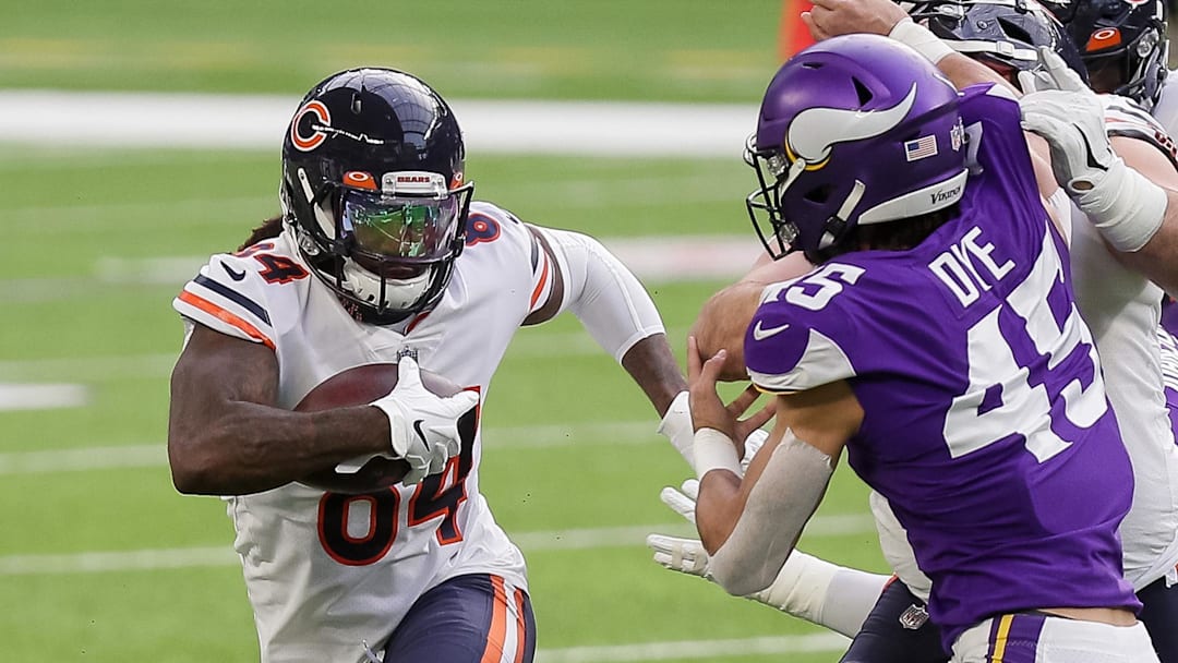 Dec 20, 2020; Minneapolis, Minnesota, USA; Chicago Bears wide receiver Cordarrelle Patterson (84) runs with the ball in the first quarter against the Minnesota Vikings at U.S. Bank Stadium. Mandatory Credit: Brad Rempel-Imagn Images