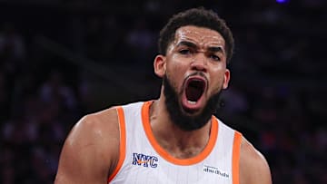 Mar 22, 2025; New York, New York, USA; New York Knicks center Karl-Anthony Towns (32) reacts during the first half against the Washington Wizards at Madison Square Garden. Mandatory Credit: Vincent Carchietta-Imagn Images