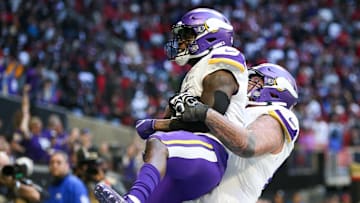 Brandon Powell and Dalton Risner