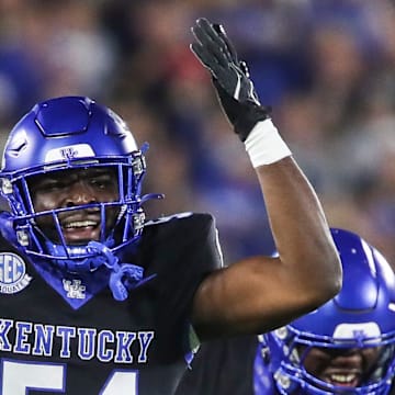 Linebacker D'Eryk Jackson (54) of the Kentucky Wildcats celebrates after making an interception against Vanderbilt in the first half. The Commodores defeated the Wildcats 20-13 at Kroger Field Saturday, Oct. 12, 2024, in Lexington, Ky.