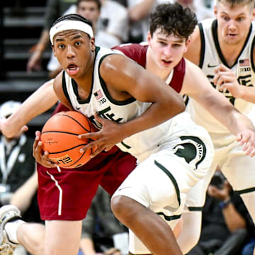Michigan State's Jeremy Fears Jr. steals the ball from Colgate during the second half on Monday, Nov. 3, 2025, at the Breslin Center in East Lansing.