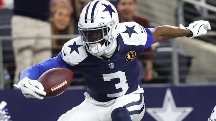 Nov 27, 2025; Arlington, Texas, USA; Dallas Cowboys wide receiver George Pickens (3) hurdles Kansas City Chiefs cornerback Trent McDuffie (22) during the fourth quarter at AT&T Stadium.