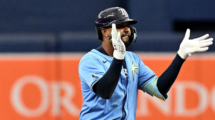 Sep 22, 2024; St. Petersburg, Florida, USA; Tampa Bay Rays third baseman Junior Caminero (13) reacts after hitting a double in the first inning against the Toronto Blue Jays at Tropicana Field. Mandatory Credit: Jonathan Dyer-Imagn Images