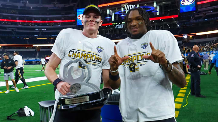 Dec 29, 2023; Arlington, TX, USA;  Missouri Tigers quarterback Brady Cook (12) takes a photo with Missouri Tigers wide receiver Luther Burden III (3) after the game against the Ohio State Buckeyes at AT&T Stadium. Mandatory Credit: Kevin Jairaj-USA TODAY Sports