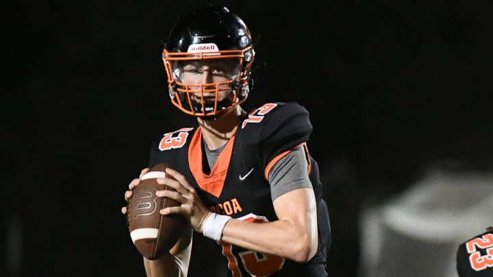 Cocoa quarterback Brady Hart, a Michigan commit, threw five first half touchdown passes in the Tigers' Kickoff Classic contest against Satellite.