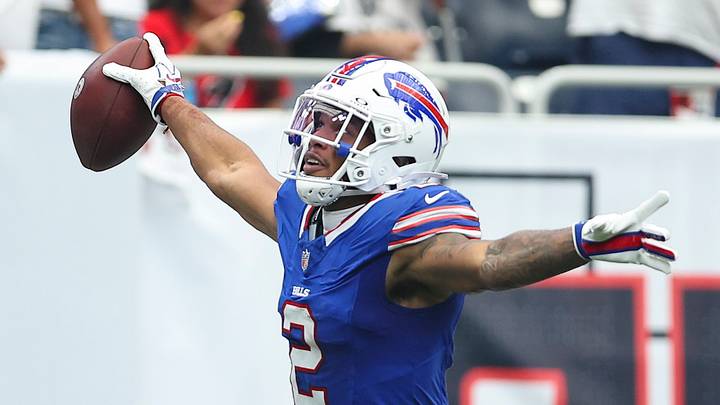 Sep 13, 2026; Houston, Texas, USA; Buffalo Bills wide receiver DJ Moore (2) runs with the ball to score a touchdown during the game against the Houston Texans at Reliant Stadium. Mandatory Credit: Troy Taormina-Imagn Images