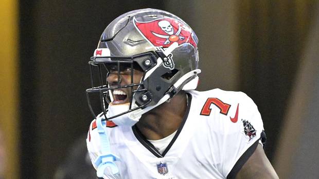 Oregon Ducks Tampa Bay Buccaneers Bucky Irving Injury Baker Mayfield College Football NFC South Big Ten NFL Draft Cardinals 