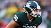 Nov 2, 2013; East Lansing, MI, USA; Michigan State Spartans linebacker Max Bullough (40) before the snap of the ball during the 2nd half of a game against the Michigan Wolverines at Spartan Stadium. MSU won 29-6. Mandatory Credit: Mike Carter-Imagn Images