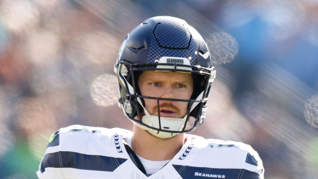 Sam Darnold of the Seattle Seahawks looks on