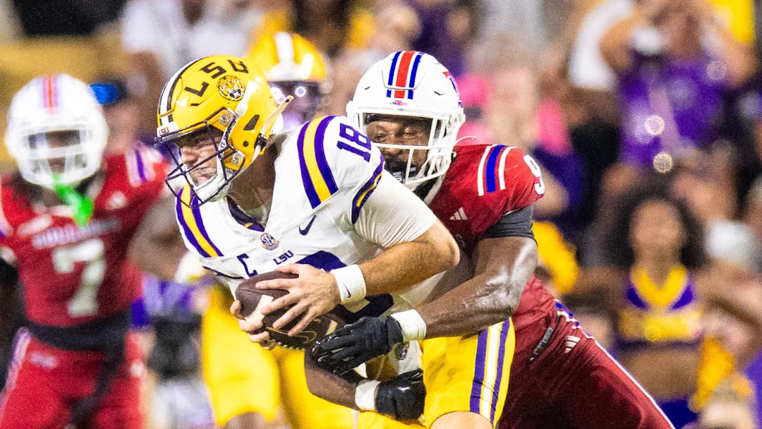 LSU Tigers quarterback Garrett Nussmeier (18) is sacked by Louisiana Tech Bulldogs linebacker Mekhi Mason (9) during the second half at Tiger Stadium. LSU Tigers quarterback Garrett Nussmeier (18) is sacked by Louisiana Tech Bulldogs linebacker Mekhi Mason (9) during the second half at Tiger Stadium.
