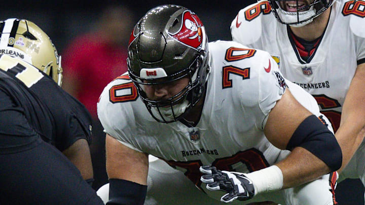 Oct 13, 2024; New Orleans, Louisiana, USA; Tampa Bay Buccaneers quarterback Baker Mayfield (6) calls for the ball from center Robert Hainsey (70) against the New Orleans Saints during he first half at Caesars Superdome. Mandatory Credit: Stephen Lew-Imagn Images Oct 13, 2024; New Orleans, Louisiana, USA; Tampa Bay Buccaneers quarterback Baker Mayfield (6) calls for the ball from center Robert Hainsey (70) against the New Orleans Saints during he first half at Caesars Superdome. Mandatory Credit: Stephen Lew-Imagn Images
